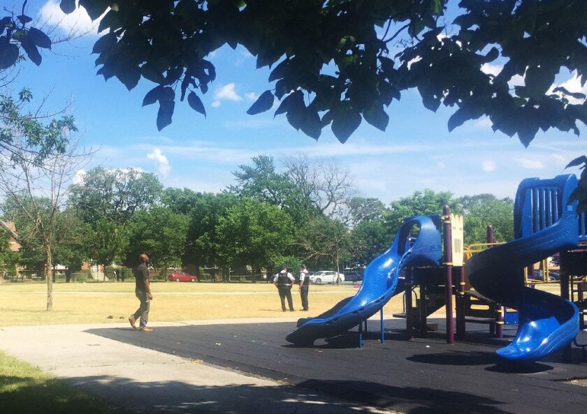 Police investigate after two students, girls aged 7 and 13, were shot Friday afternoon outside Warren Elementary school on the Far South Side. | Francesca Gattuso/Sun-Times