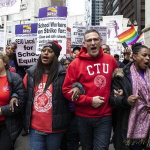 Chicago Teachers Union Vice President Stacy Davis Gates (center, left) and CTU President Jesse Sharkey (center, right) lead thousands of striking union members on a march through the Loop, Thursday afternoon, Oct. 17, 2019.