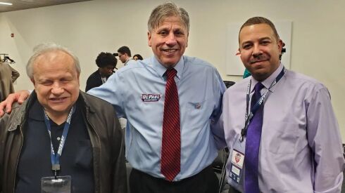 Craig Lynch, left, with Doug Bruno and Tim McKinney, right, was a longtime friend and former classmate of the DePaul women’s basketball coach.
