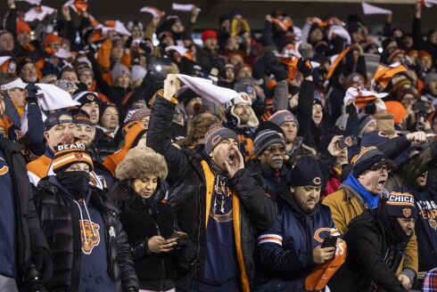 Chicago Bears fans cheer during the first quarter against the Green Bay Packers at Soldier Field.