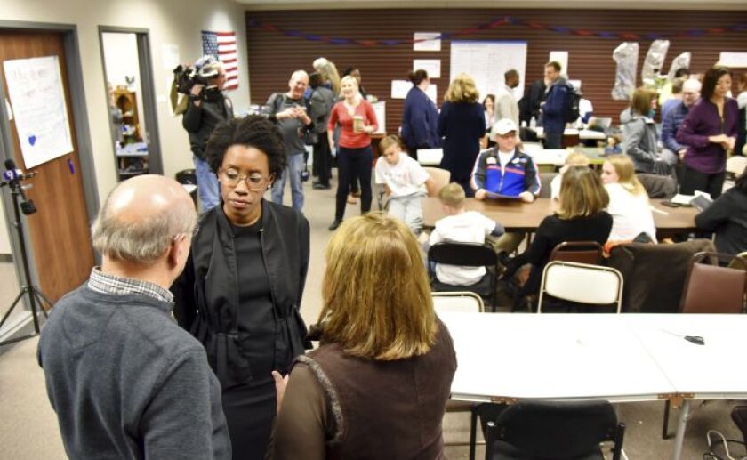 Illinois 14th Congressional winner Lauren Underwood talks with volunteers and supporters of her campaign at her headquarters in St. Charles, a day after the election. | John Starks/Daily Herald
