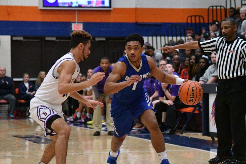Bloom’s Donovan Newby (1) around the corner against Bloomington. Newby recently committed to Wisconsin-Milwaukee.