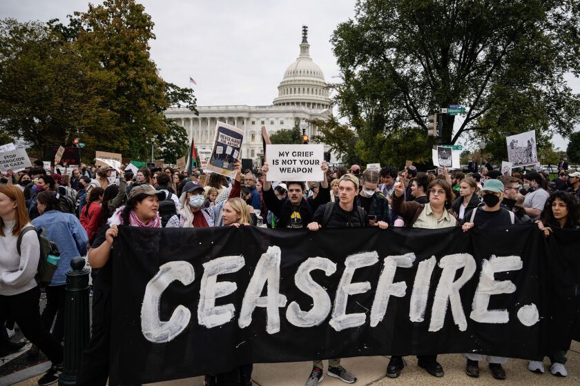 Demonstrators rally Wednesday near the U.S. Capitol to demand a ceasefire against Palestinians in Gaza. Hundreds of demonstrators were arrested inside the Cannon House office building. That protest was organized by Jewish Voice for Peace and IfNotNow.