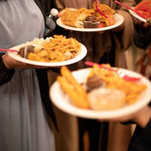 Women talk as they eat their Iftar meal in which Muslims break their Ramadan fast, on May 25, 2018 at the Muslim Community Center in North Chicago. I Maria de la Guardia/Sun-Times