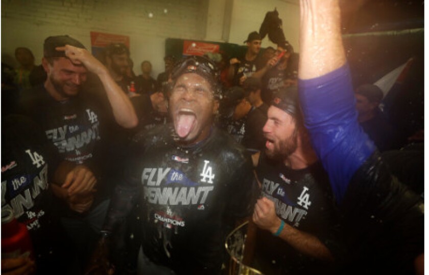 <em>Yasiel Puig celebrates in clubhouse</em>