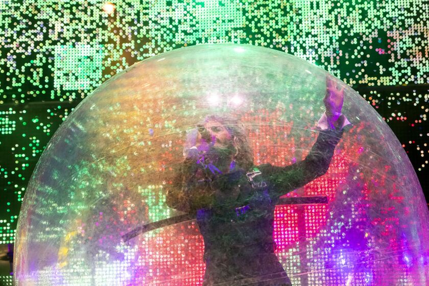 The Flaming Lips performs at the Roots Stage on the final day of Riot Fest at Douglass Park.