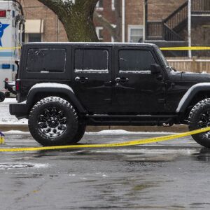 Chicago police investigate the scene where an off-duty Chicago police officer was shot in the 8900 block of South Stony Island Ave. in Calumet Heights, Monday, March 15, 2021.