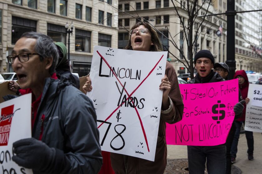 Protesters rallied outside City Hall on April 10, the day $1.6 billion in subsidies for two mega-developments, Lincoln Yards and “The 78,” were approved by the Chicago City Council. | Ashlee Rezin/Sun-Times