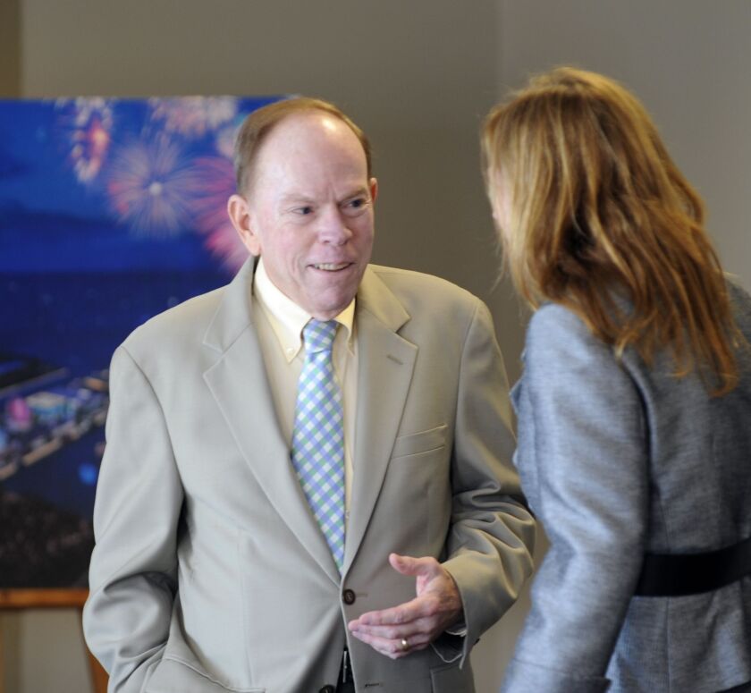 Jim Reilly talking in 2011 with Marilynn Gardner, now president and chief executive officer of Navy Pier Inc.