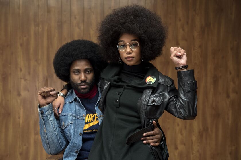 John David Washington stars with Laura Harrier in “BlacKkKlansman.” | FOCUS FEATURES