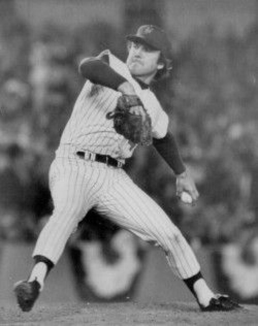 Tug McGraw, Mets relief pitcher, (pictured in 1973) winds up after he replaced Jerry Koosman for Mets in seventh inning of fifth World Series game against A’S.McGraw held A’S in check as Mets won, 2-0. | AP FILE PHOTO/AP