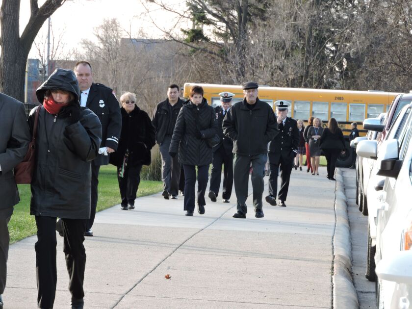 Mourners walk to St. Rita to honor Daniel Capuano. | Brian Jackson/For the Sun-Times