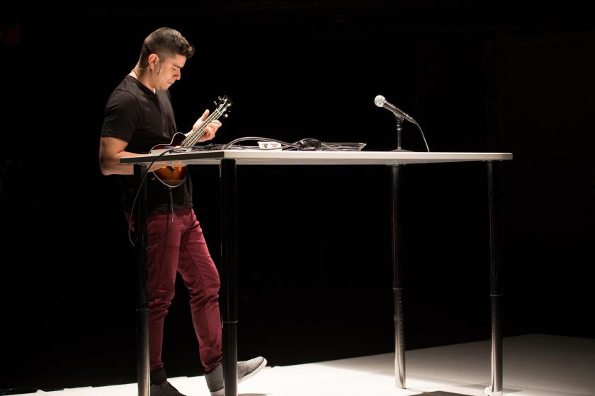 Brian Quijada in his one-man Teatro Vista show “Where Did We Sit on the Bus?” Joel Maisonet photo