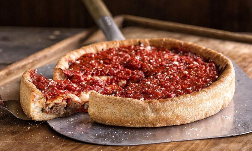 Pizzeria Uno deep dish pizza is served.