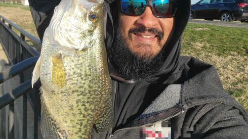 Keerthan Krishnan traveled a long way in the Chicago suburbs to catch a big crappie.