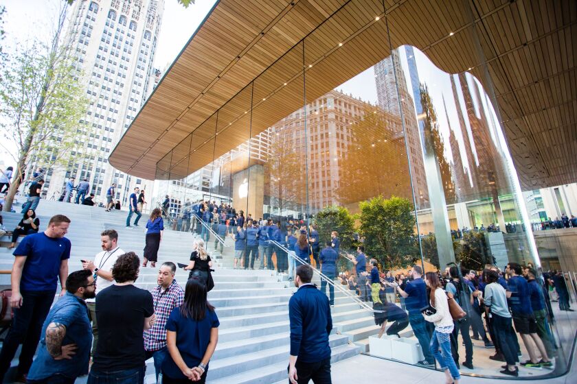 One man waited in line more than a day to be the first customer inside Apple’s new store on Michigan Avenue. | James Foster/For the Sun-Times