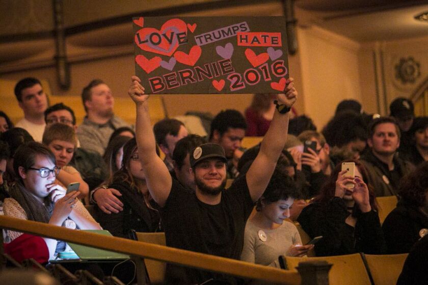 A Bernie Sanders’ fans makes it clear whose side he’s on. | Ashlee Rezin/Sun-Times