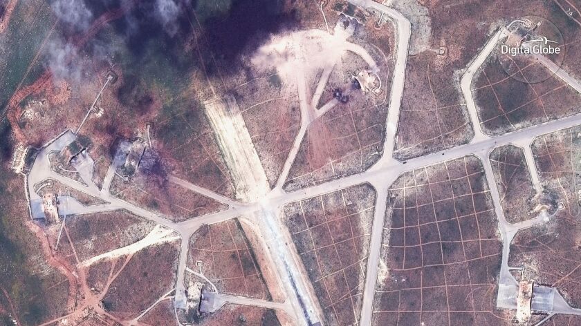 This satellite image provided by DigitalGlobe shows an image captured on April 7 of the northwest side of the Shayrat air base in Syria, following U.S. strikes. The United States blasted the air base with a barrage of cruise missiles in fiery retaliation