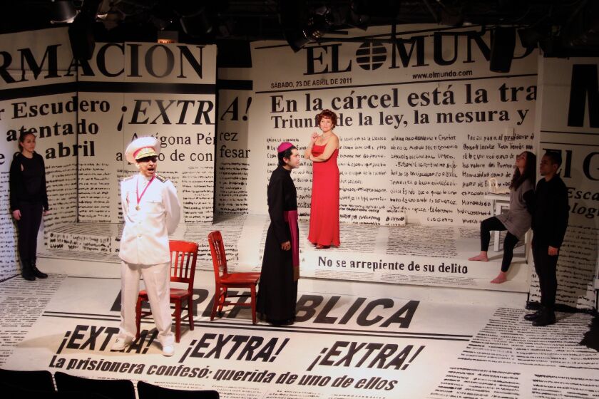 Raúl Romero as the Generalísimo Creón Molina and Elio Leturia as Monseñor Bernardo Escudero in a scene from the 2011 production of “La Pasíon Según Antígona Pérez” by Aguijón Theater.
