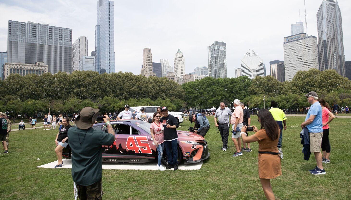 NextImg:NASCAR fans — and other spectacle seekers — take in the ‘free experience’ outside Chicago Street Race course