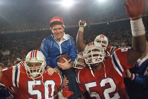 In this Jan. 12, 1986, file photo, New England Patriots coach Raymond Berry gets a victory ride from players Larry McGrew (50) and Johnny Rembert (52) after the Patriots defeated the Dolphins 31-14 in the AFC playoffs in Miami.