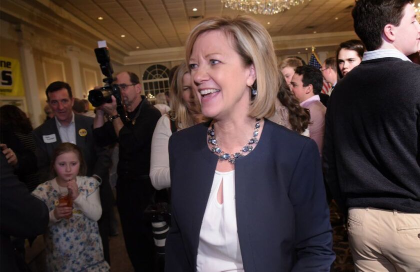 Republican gubernatorial candidate Jeanne Ives greets supporters at her election night party in Glen Ellyn, Ill. on Tuesday, March 20, 2018. (AP photo / Daily Herald, Mark Black))