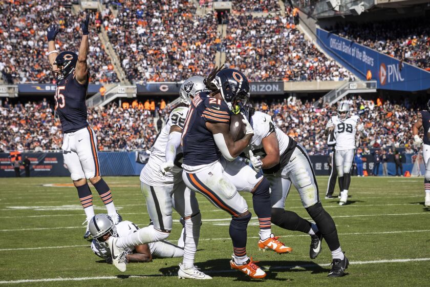 Chicago Bears running back D’Onta Foreman #21 runs in a touchdown during the third quarter against the Las Vegas Raiders at Soldier Field, Sunday, Oct. 22.
