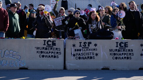 Protesters gather outside an ICE processing facility in Broadview, Ill. a suburb of Chicago, Friday, Oct. 24, 2025.
