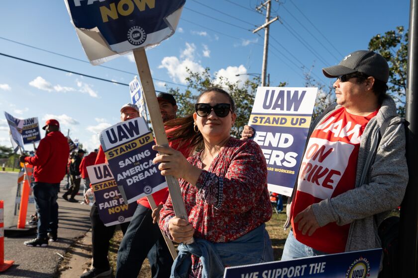 Ford workers who are members of United Auto Workers rally outside the Ford Sequencing Center at 12429 S. Burley Ave. on the South Side, Saturday, Oct. 7, 2023. Ford Chicago Assembly Plant workers joined other UAW workers in other states, who have been on strike since September, last week.
