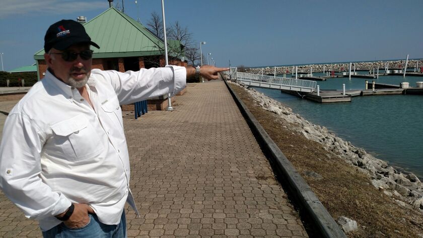 Scott Stevenson explains some of the work being done at North Point Marina.<br>Credit: Dale Bowman