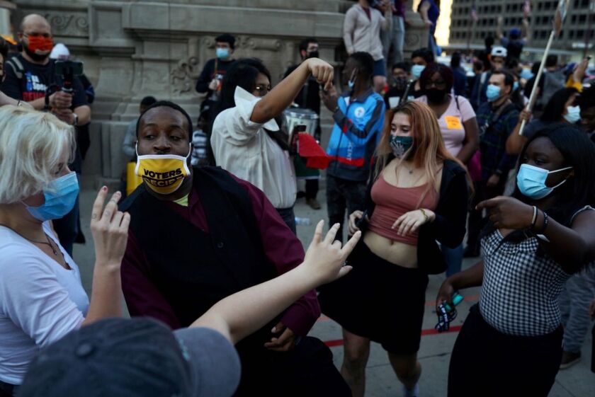 Chicagoans celebrate Joe Biden’s White House win on Saturday.