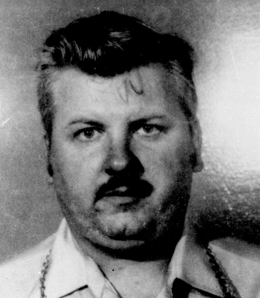 FILE - This 1978 file photo shows serial killer John Wayne Gacy, who was convicted of killing 33 young men and boys in the Chicago area in the 1970s and executed in 1994. More than 40 years after a collection of decaying bodies was found beneath Gacy’s house, authorities announced Monday, Oct. 25, 2021, that they have identified the remains of one more of his victims. (AP Photo, File) ORG XMIT: CER203