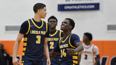 Lincoln Park’s Ahmad Lee (3) and Larry Harris (24) react against Young last season.