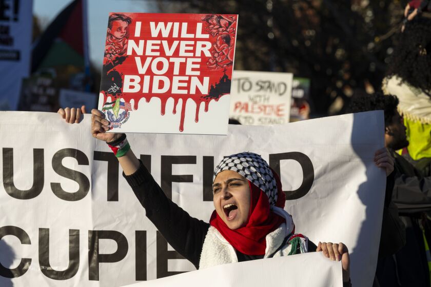 Around a thousand Palestinian and pro-Palestinian demonstrators rallied at the corner of W. Hubbard St. and N. Armour St. near where President Joe Biden was attending a fundraising event in the West Town neighbohood, Thursday, Nov. 9, 2023. Demonstrators were demanding that the President as well as national Democrats use their power to broker a ceasefire between Israel and Hamas whose conflict has killed thousands of civilians most of whom are Palestinian.