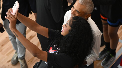 Former President Barack Obama poses for a selfie with WNBA All-Star Angel Reese during a practice at the Obama Presidential Center in Chicago on Friday, July 24, 2026.