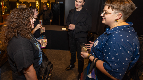 In center, author Veronica Roth with fellow book enthusiasts during “A Celebration of The Sixth Faction” at Navy Pier in Chicago, IL on Wednesday, August 12, 2026.