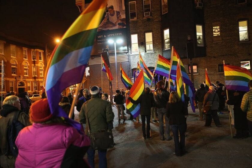 Multi-generational supporters of same-sex marriage gather in Boystown after the Illinois General Assembly passed a marriage equality bill in November 2013. | Getty Images