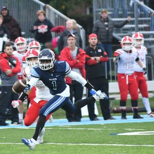 Nazareth’s Jalion Welch (1) goes for the interception. Worsom Robinson/For the Sun-Times.
