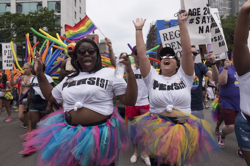 Members of the Persist float in the 2019 Chicago Pride Parade