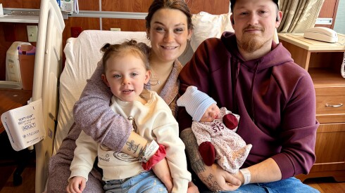 Parents Tye and Ian Buckley and their first child, Reagan Buckley, hold their newborn daughter, Kendall Quinn Buckley, born on Jan. 1, 2026 at at Ascension Saint Alexius Women and Children's Hospital in Hoffman Estates.