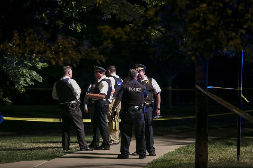 Chicago Police investigate near 18th Street and Calumet Avenue, where an officer was shot during an exchange of gunfire that left the suspect dead Thursday. | Ashlee Rezin/Sun-Times