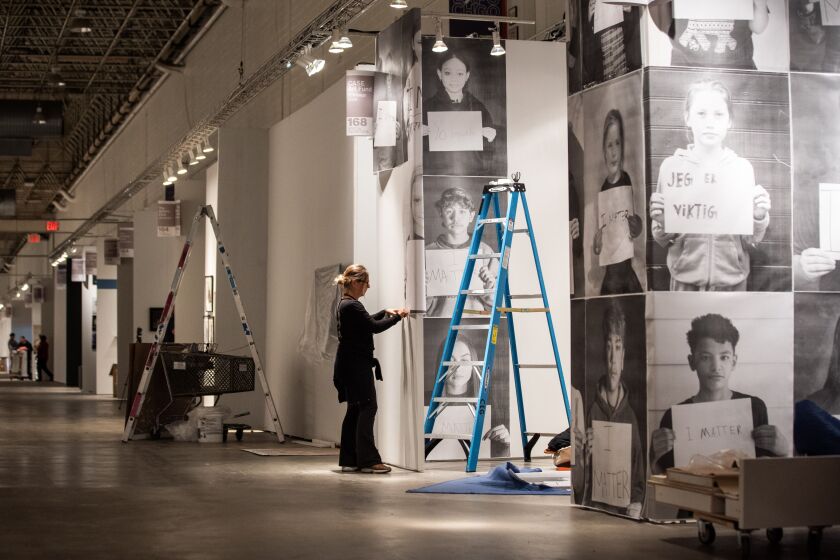 Anette Skuggedal, founder of CASE Art Fund, was at Navy Pier on Wednesday, April 6, 2022 to set up “I Matter,” an exhibit about children’s human rights. She will be among 140 exhibitors at Expo Chicago, which kicks off Thursday with an invitation-only event and opens to the public on Friday. The event runs through Sunday.