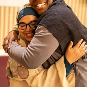 Two new friends, who have both converted to Islam, embrace at the Muslim Community Center in North Chicago on May 25, 2018. I Maria de la Guardia
