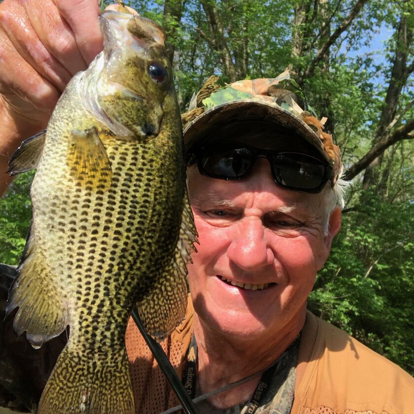 George Peters with a good rock bass from the Vermilion River. Provided photo