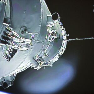 The Shenzhou-10 manned spacecraft is seen while conducting docking with the orbiting Tiangong-1 space module. China’s defunct and believed out-of-control Tiangong 1 space station is expected to re-enter Earth. | Beijing Aerospace Control Center/Xinhua via