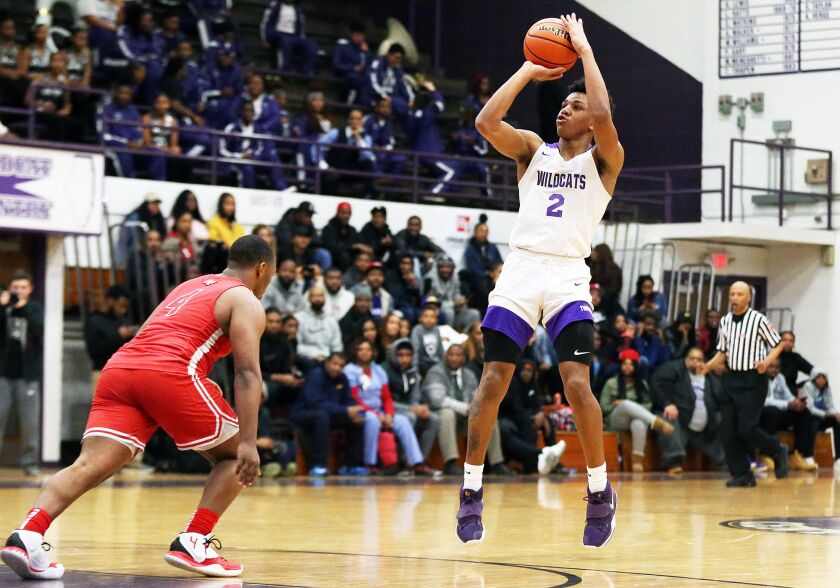 DJ Williams drains a three against Homewood-Flossmoor last season.