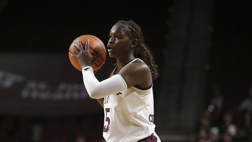 Texas A&M guard Aicha Coulibaly examines the court during a game against Kansas State on Sunday, Dec. 8, 2024, in College Station, Texas.