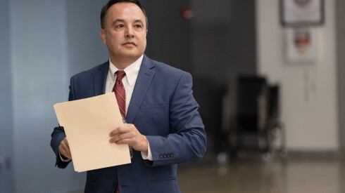 Cook County Board of Review Commissioner George Cardenas walks to the stage to speak during a Cook County Democratic Party pre-slating event for candidates running for county-wide positions at IBEW Local in Bronzeville, Wednesday, April 16, 2025.