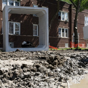 A concrete water storage unit is seen in the 5500 block of W. LeMoyne Street in Austin.