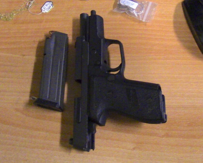 Police released a photo of a weapon allegedly stolen during the scheme. | Chicago police